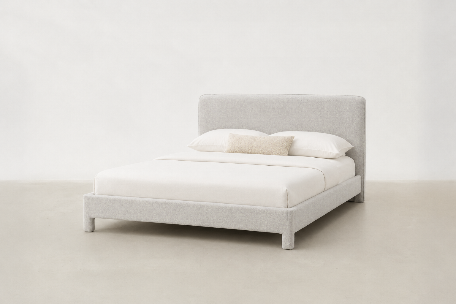 Bouclé platform bed with curved headboard and wide base – Aurora bed frame for Japandi Canadian bedrooms