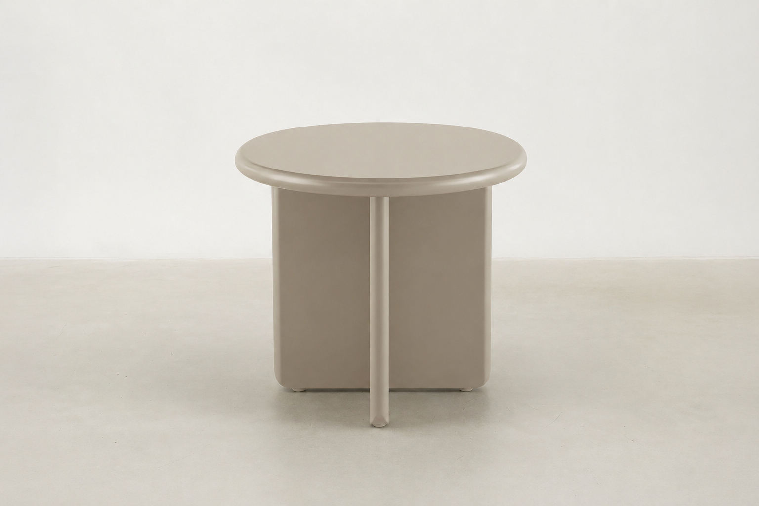 Arbor sculptural end table in matte beige with rounded pebble shape
