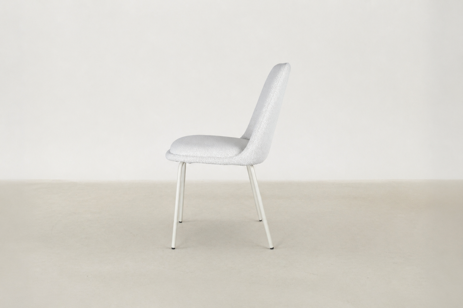 Bouclé dining chair with curved backrest and white metal legs – Aura chair for Canadian interiors