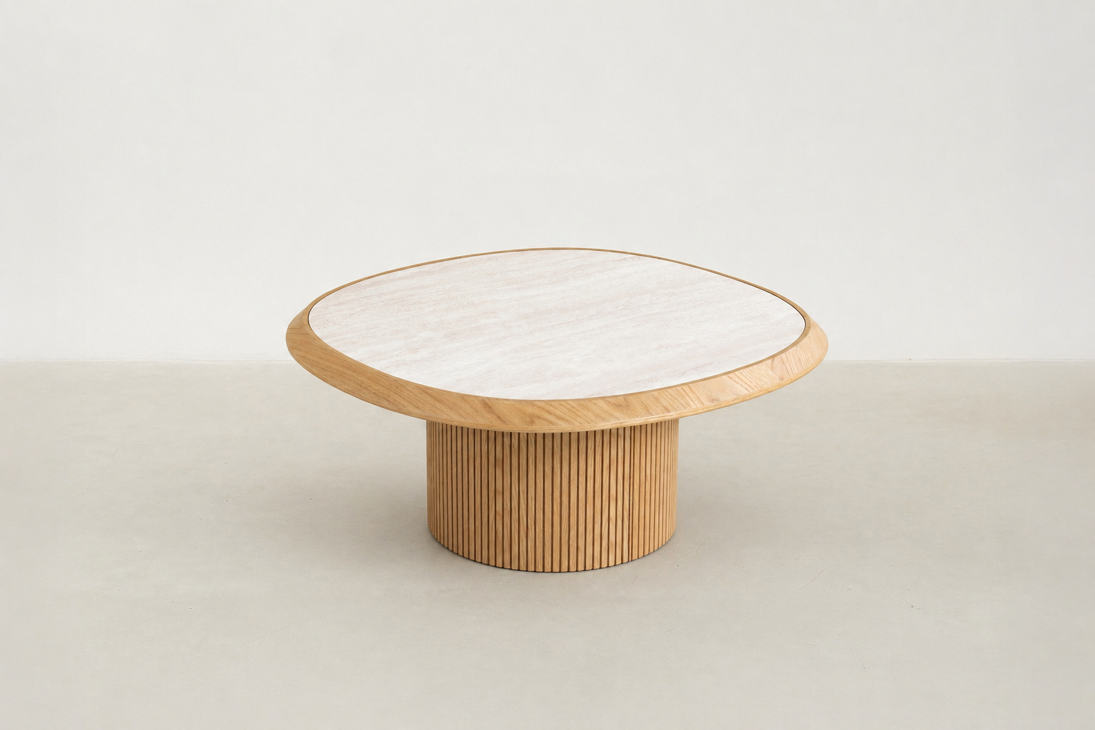 Japandi-inspired Galatero pairs a travertine-look tempered-glass top with an oak fluted pedestal, delivering an airy profile that’s minimal, elegant, and made for everyday living.