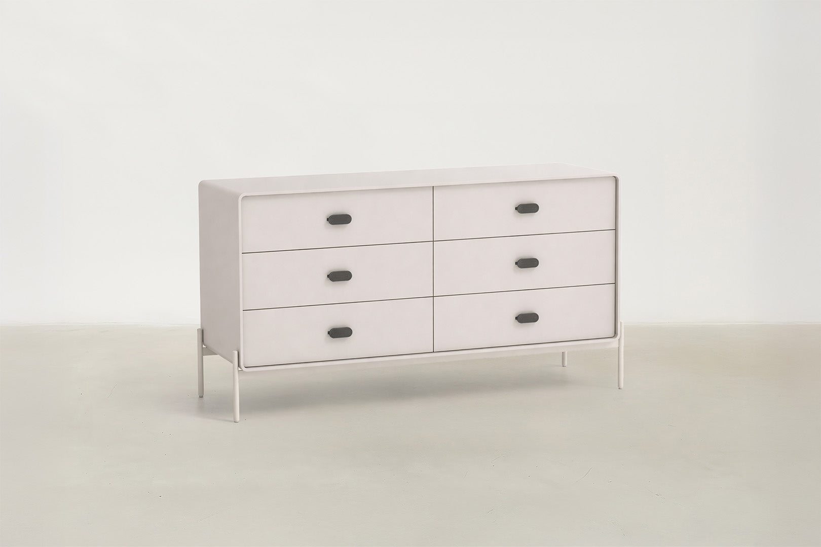 Lilane Luxe dresser in matte beige with wave handle design and metal legs