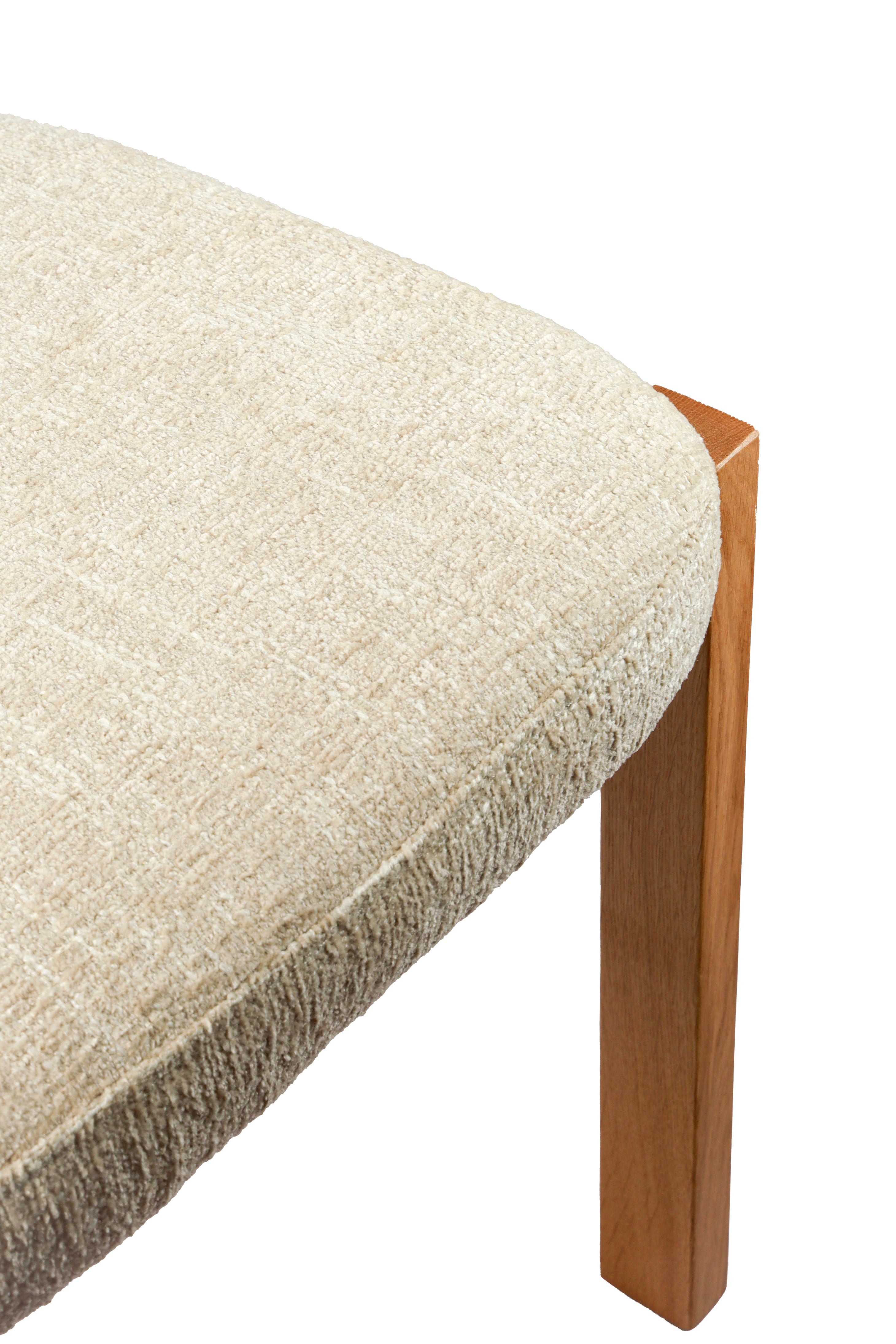 Sora Japandi dining chair with textured cream fabric and solid oak wood frame in natural stain