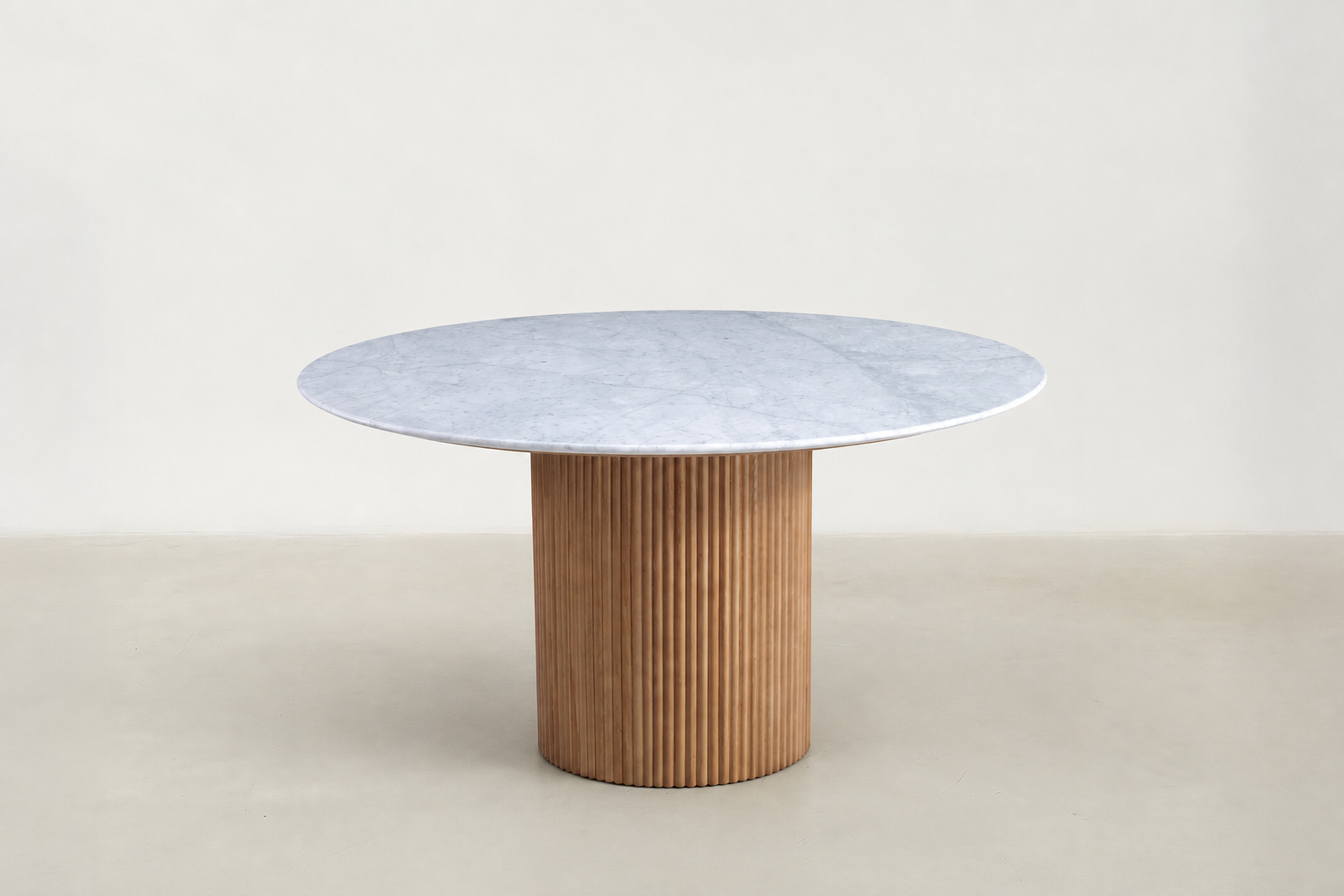 "Milo round marble dining table with fluted walnut base and Japandi-inspired design.
"
