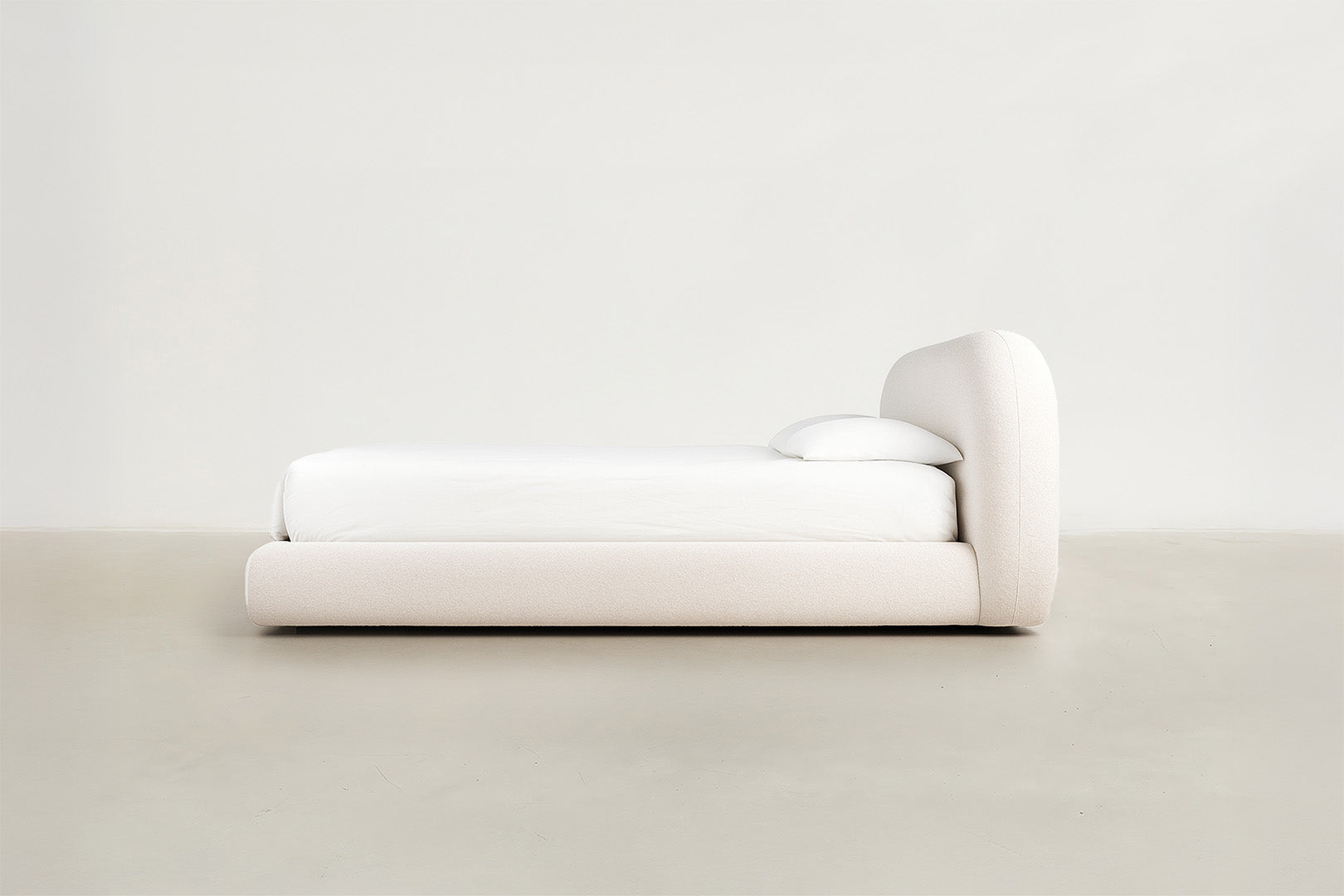 Front view of Hoku boucle storage bed with lift-up storage