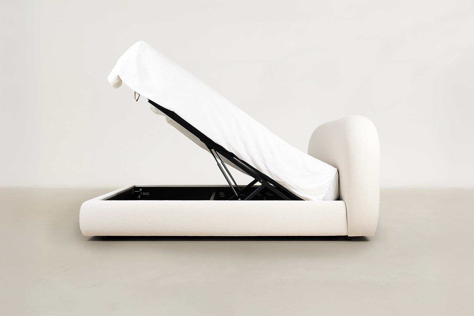 Front view of Hoku boucle storage bed with lift-up storage