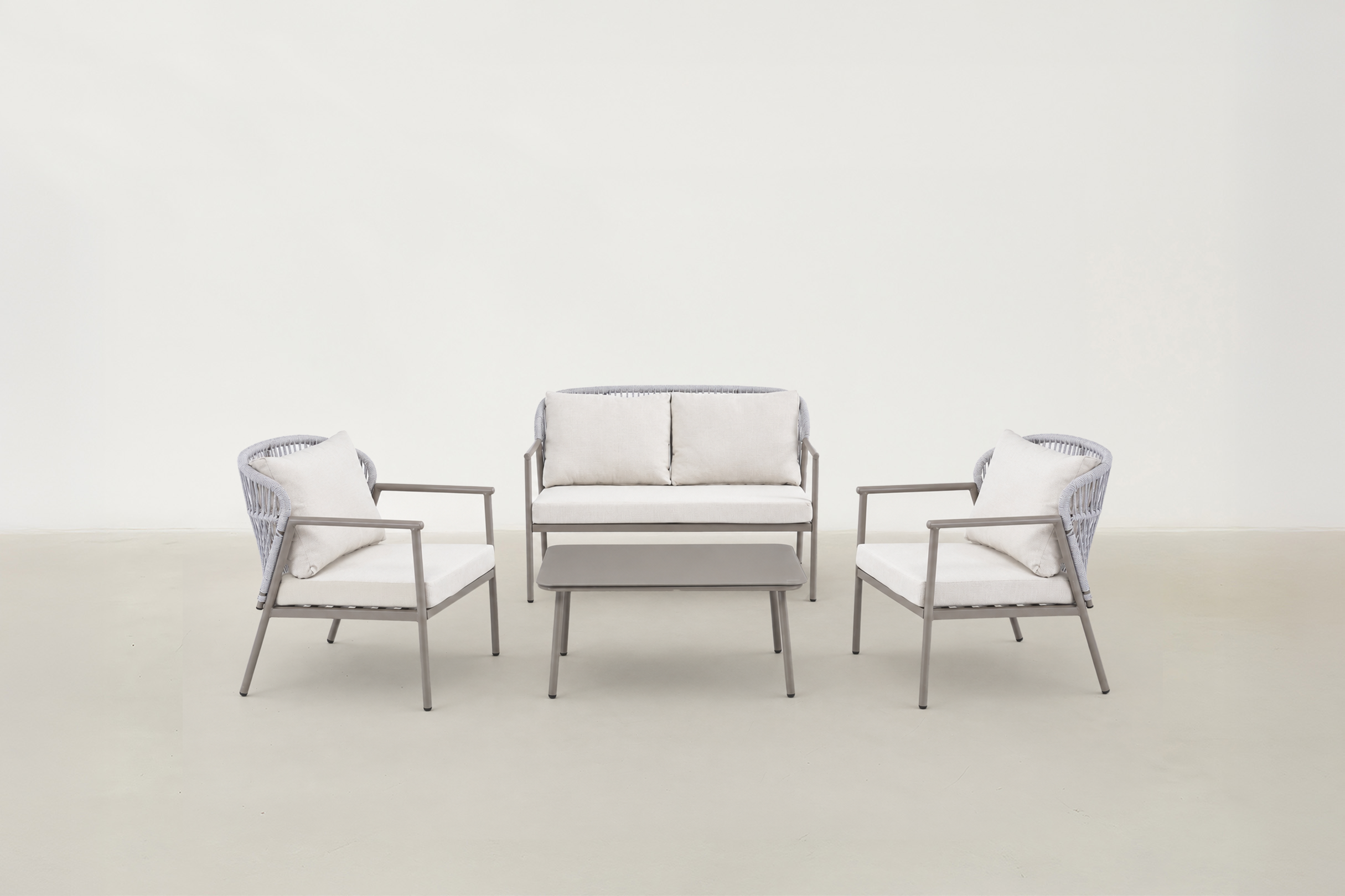 Sandvik Japandi outdoor patio set with all-weather rope seating and tempered glass coffee table