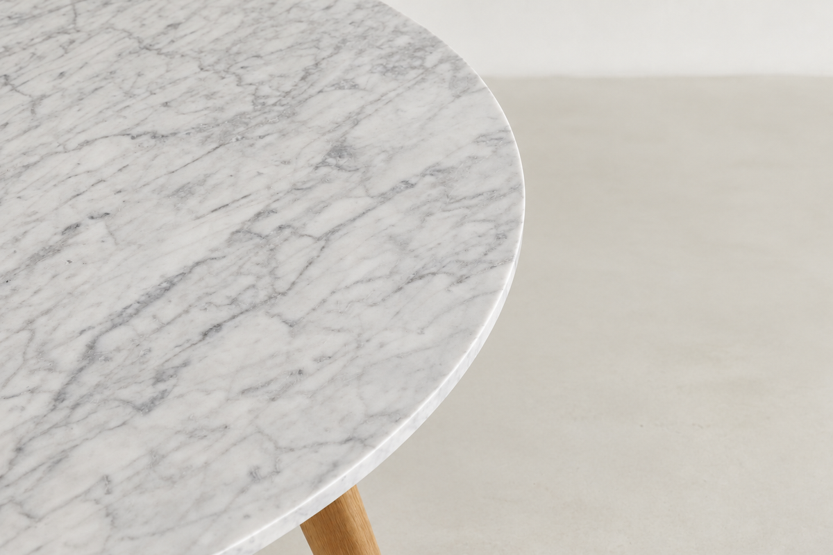 Tami Japandi round dining table with polished Carrara white marble top and solid wood legs