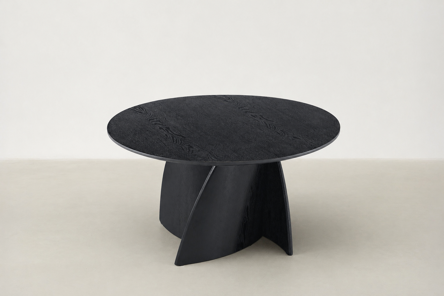Narta Japandi round coffee table with deep black oak finish
