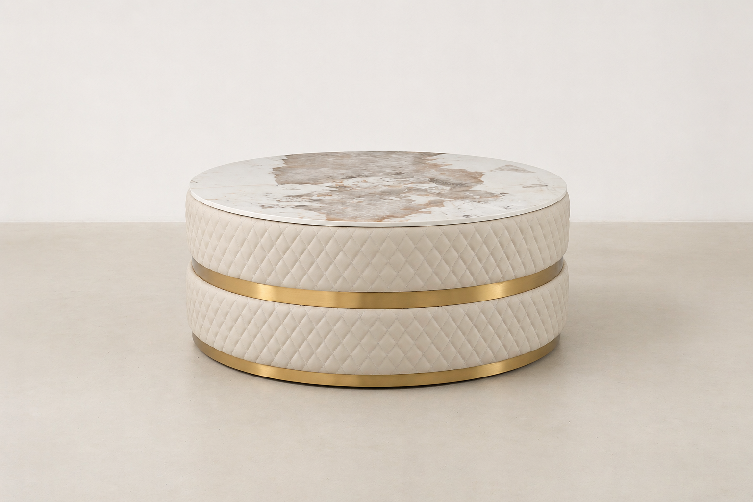 Sassaste luxury round coffee table with faux-marble top, quilted PU leather base, and gold accent banding.