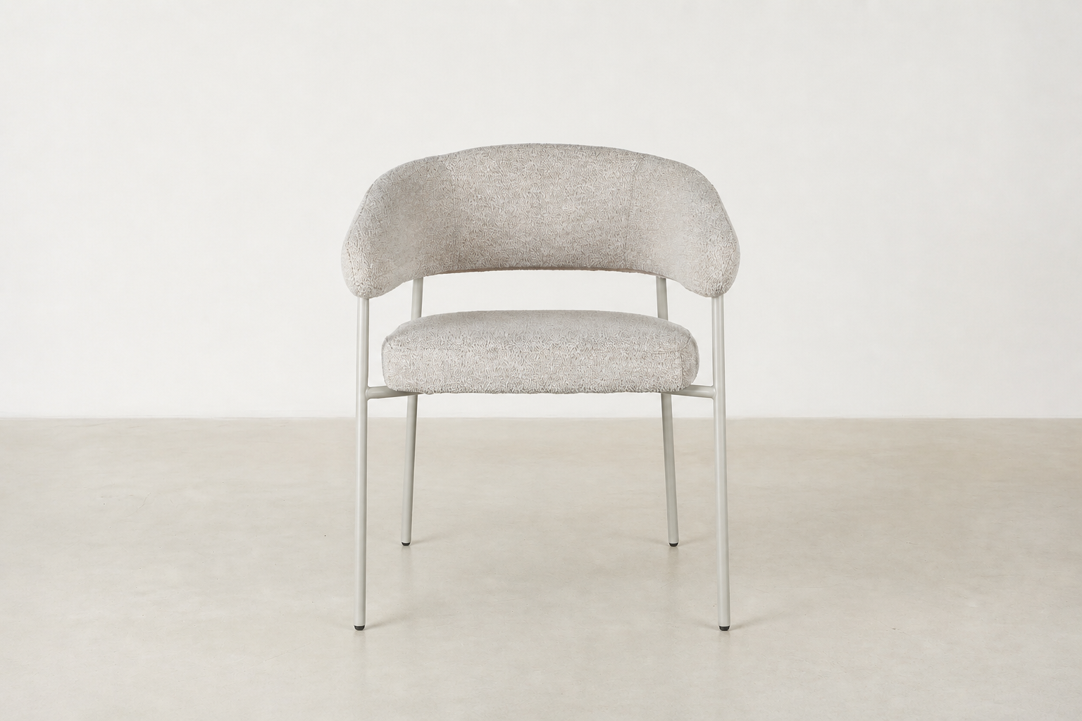 Front view of Vista dining chair in beige textured fabric with curved backrest