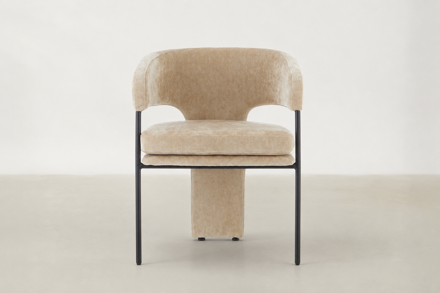 Aballo dining chair in chenille velvet with wraparound back and black steel frame