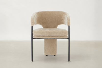 Aballo dining chair in chenille velvet with wraparound back and black steel frame