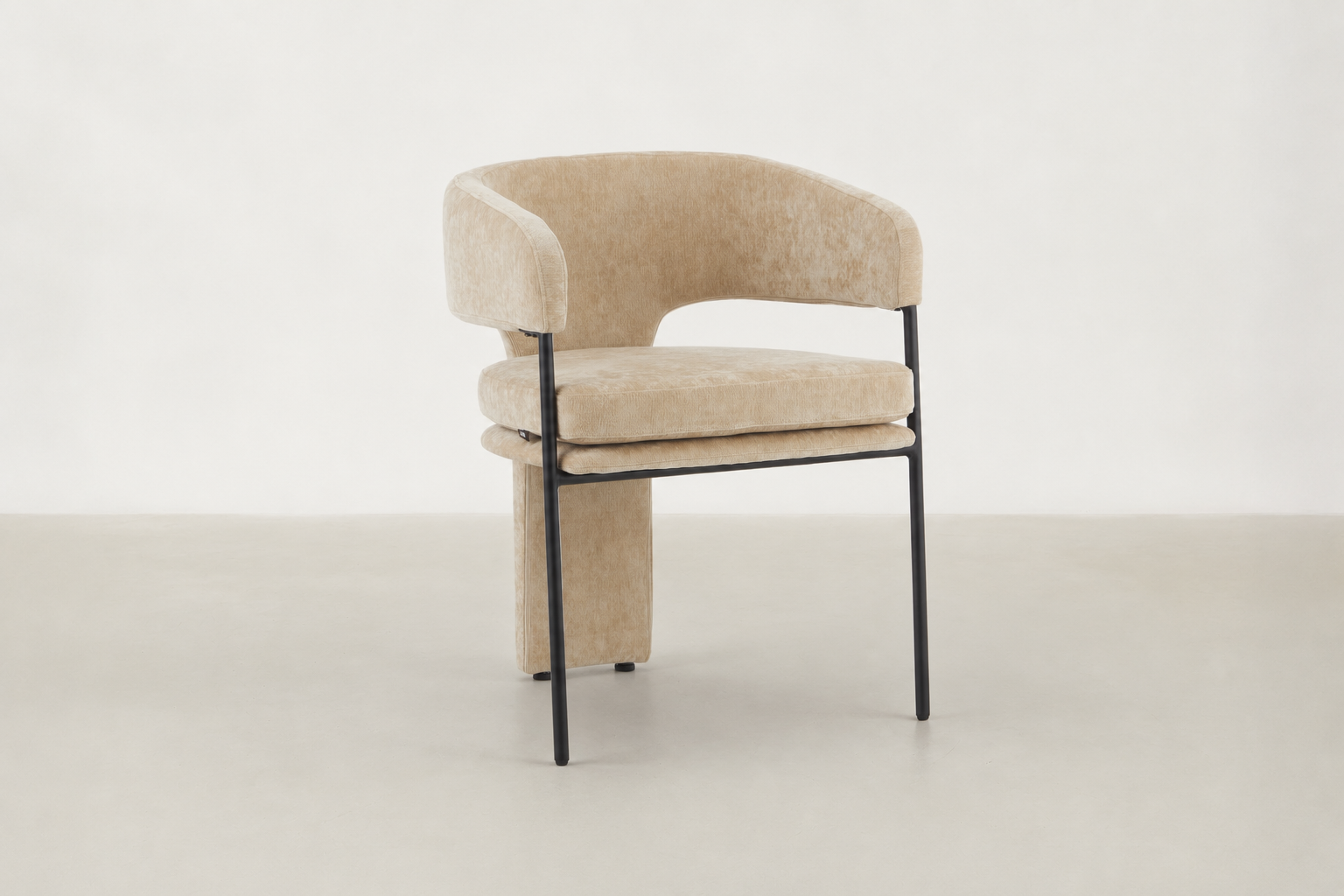 Aballo modern dining chair with upholstered rear leg detail and powder-coated steel frame