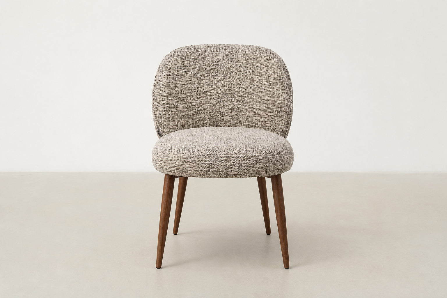 Apua dining chair with textured polyester upholstery, scoop-back design, and walnut-finish steel legs
