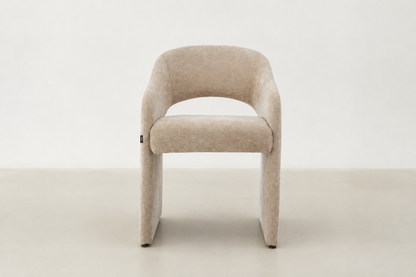 Curved upholstered dining chair with chenille fabric and handle detail – Arabona chair for Canadian dining rooms