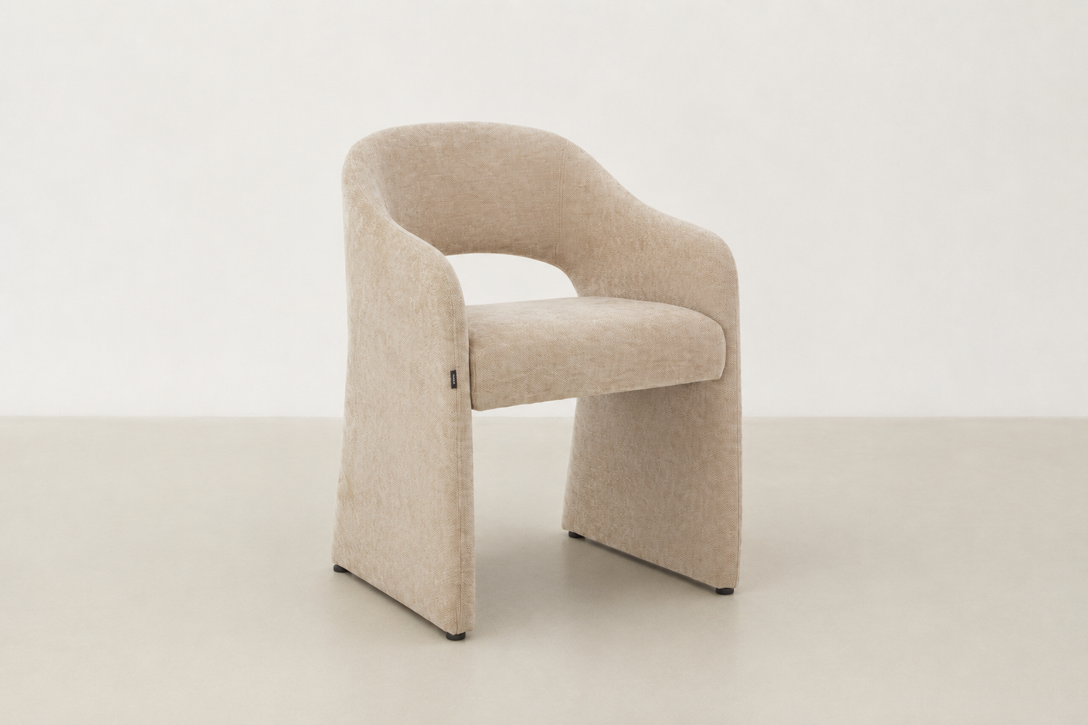 Curved upholstered dining chair with chenille fabric and handle detail – Arabona chair for Canadian dining rooms