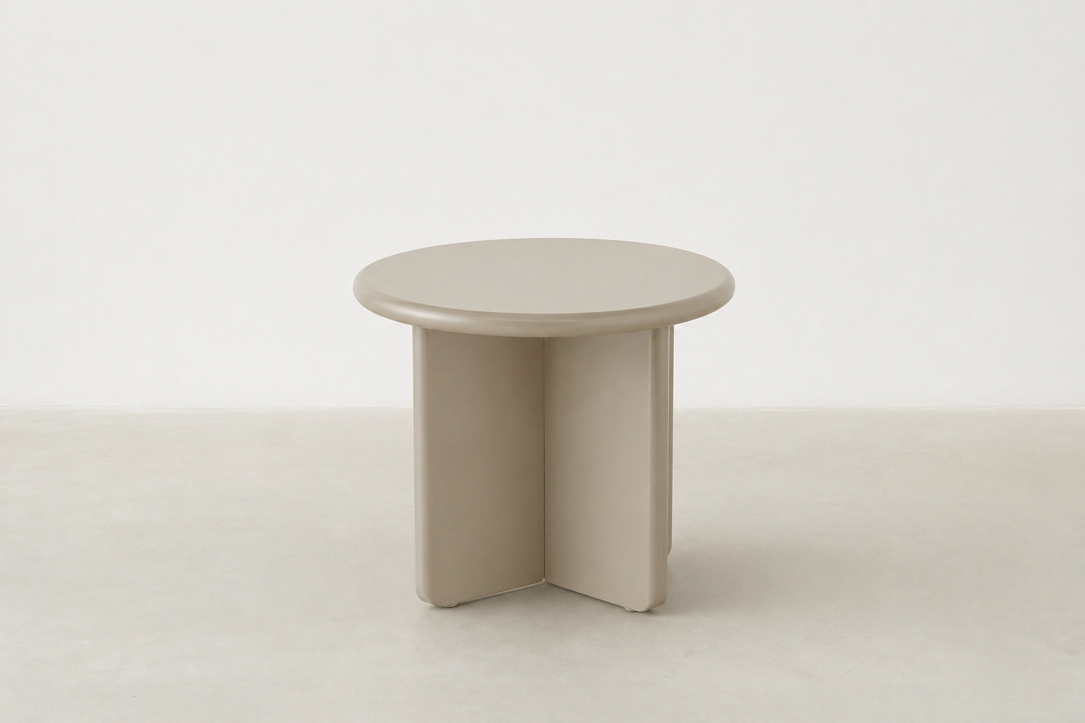 Arbor sculptural end table in matte beige with rounded pebble shape