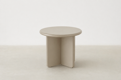 Arbor sculptural end table in matte beige with rounded pebble shape