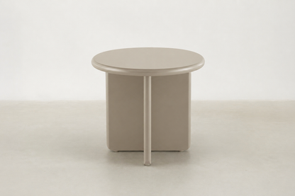 Arbor sculptural end table in matte beige with rounded pebble shape