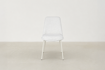 Bouclé dining chair with curved backrest and white metal legs – Aura chair for Canadian interiors
