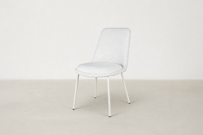 Bouclé dining chair with curved backrest and white metal legs – Aura chair for Canadian interiors
