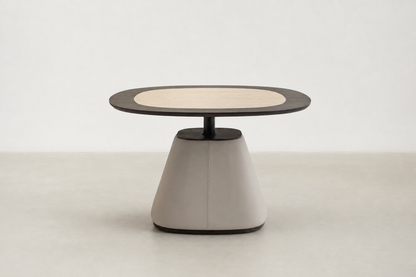 Cotolas dining table with travertine-look sintered stone top, smoked oak veneer frame, and vegan leather base