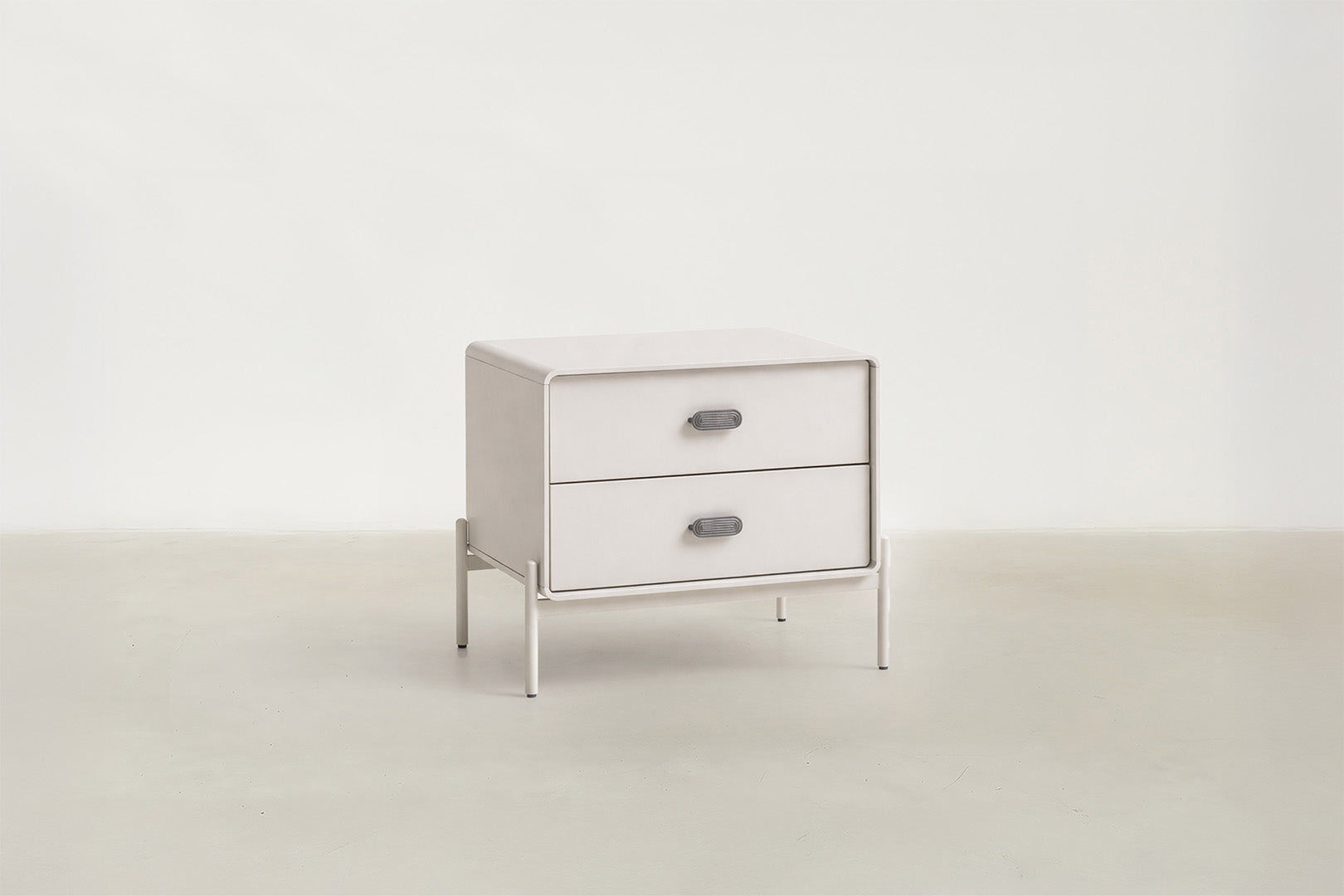 Lilane Luxe nightstand in matte beige with wave handle design and metal legs