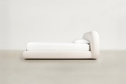 Front view of Hoku boucle storage bed with lift-up storage