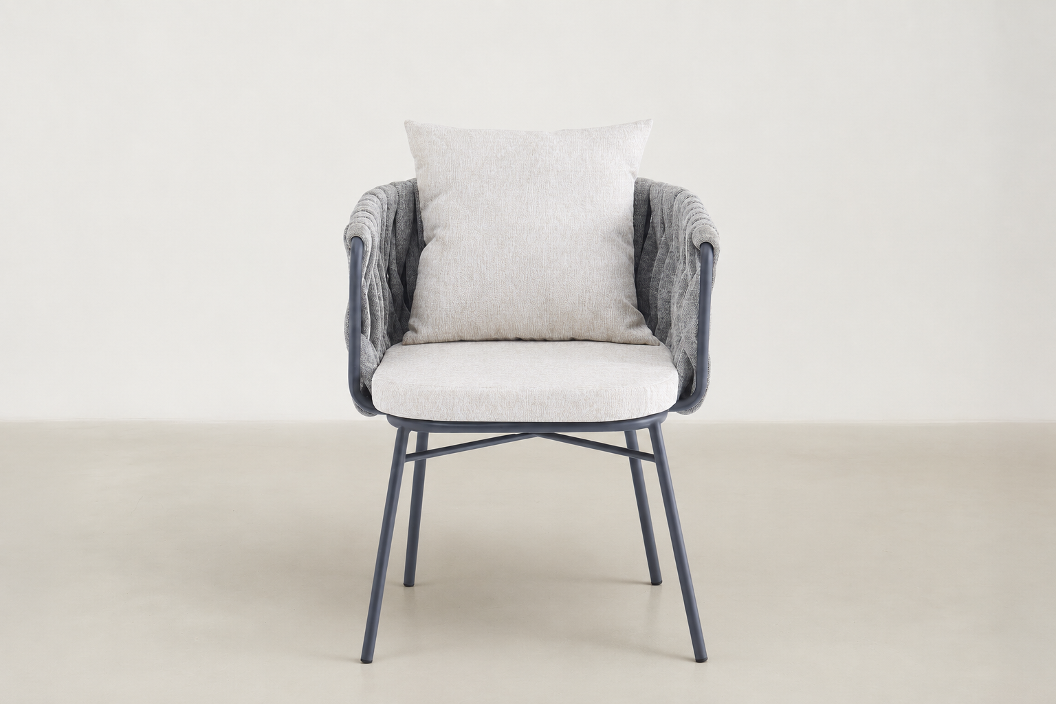 Sandbrekka Luxe outdoor dining chair with sintered stone table and all-weather rope chairs