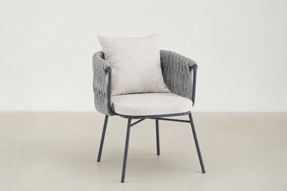 Sandbrekka Luxe outdoor dining chair with sintered stone table and all-weather rope chairs