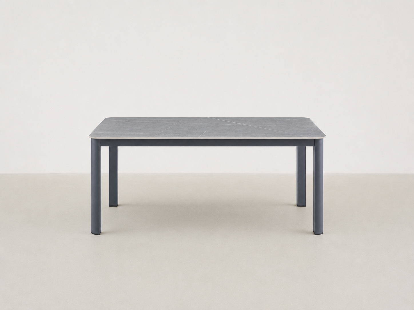 Sandbrekka Luxe outdoor dining table with sintered stone table and all-weather rope chairs
