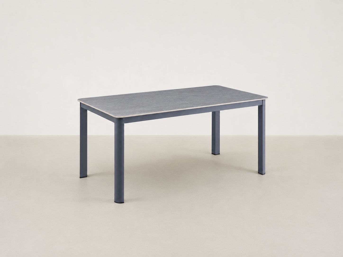Sandbrekka Luxe outdoor dining table with sintered stone table and all-weather rope chairs