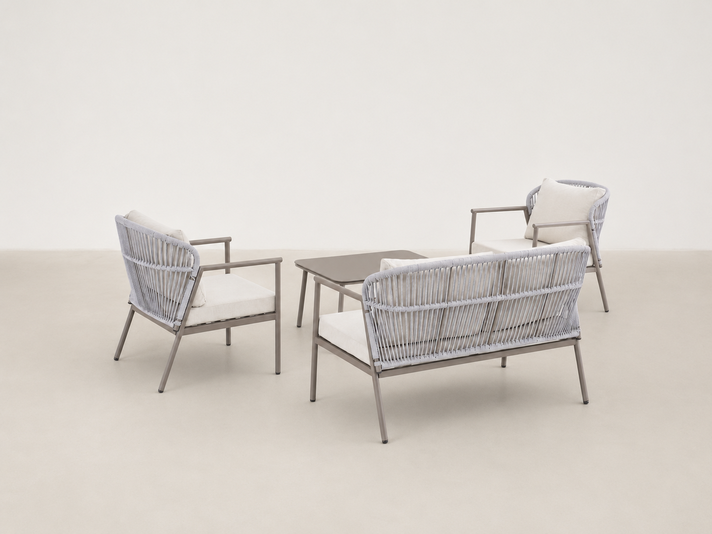 Sandvik Japandi outdoor patio set with all-weather rope seating and tempered glass coffee table