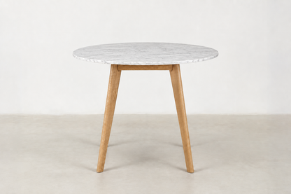 Tami Japandi round dining table with polished Carrara white marble top and solid wood legs
