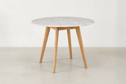 Tami Japandi round dining table with polished Carrara white marble top and solid wood legs