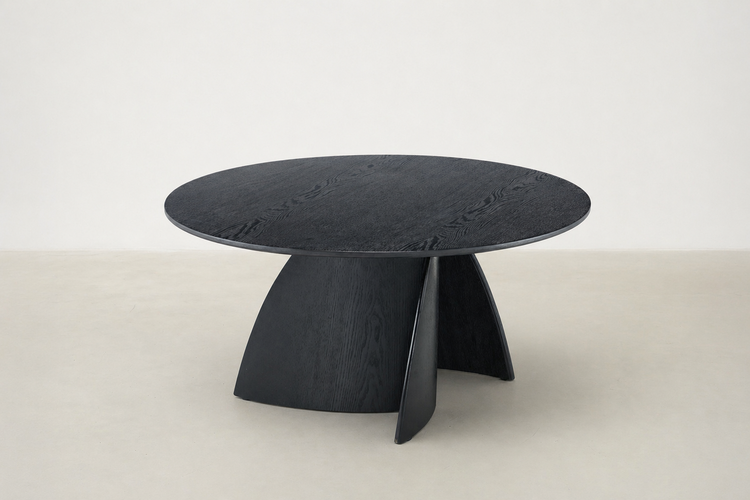 Narta Japandi round coffee table with deep black oak finish