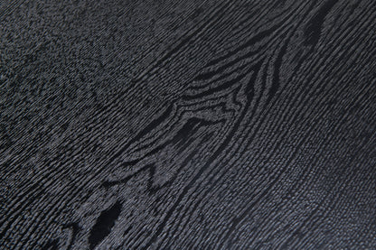 Narta Japandi round coffee table with deep black oak finish