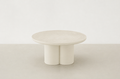 Pari Japandi coffee table with rounded silhouette and textured microcement finish