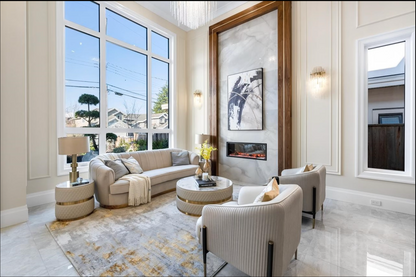 Sassaste luxury round coffee table with faux-marble top, quilted PU leather base, and gold accent banding.
