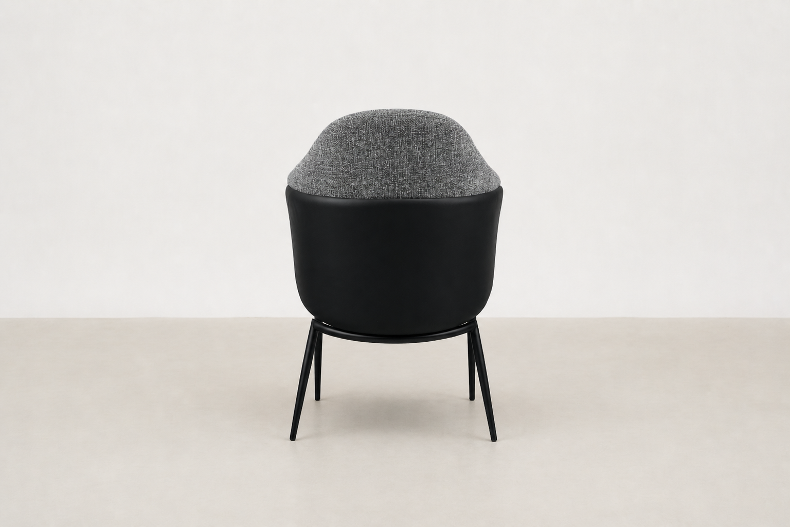 "Sitifis modern curved back dining chair in grey fabric with taupe faux leather back and black steel legs.
"