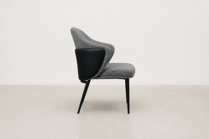 "Sitifis modern curved back dining chair in grey fabric with taupe faux leather back and black steel legs.
"