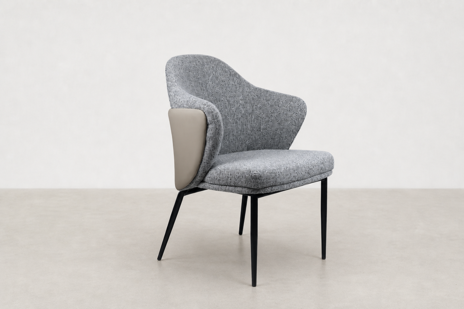 "Sitifis modern curved back dining chair in grey fabric with taupe faux leather back and black steel legs.
"