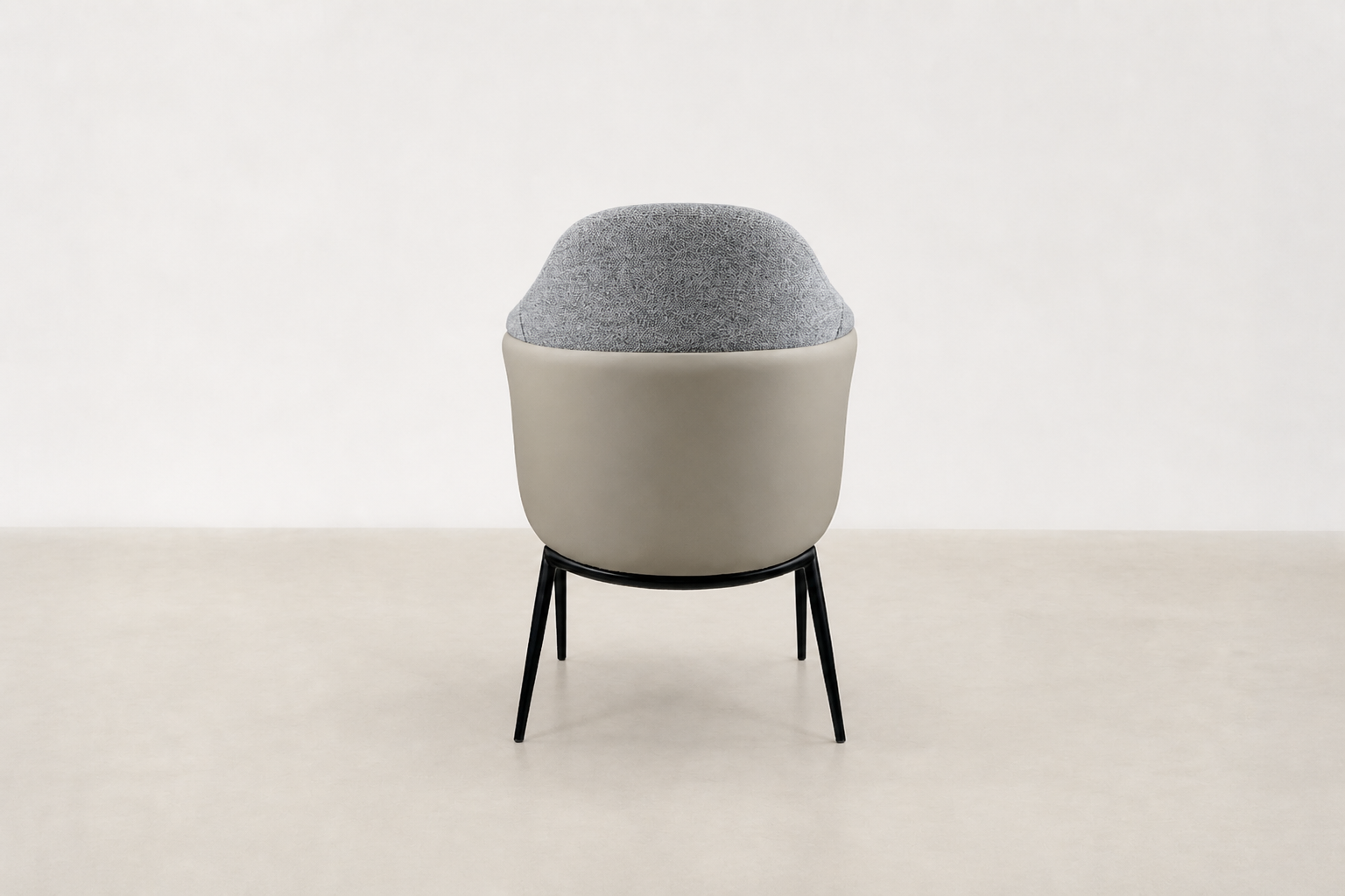 "Sitifis modern curved back dining chair in grey fabric with taupe faux leather back and black steel legs.
"