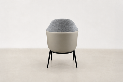 "Sitifis modern curved back dining chair in grey fabric with taupe faux leather back and black steel legs.
"
