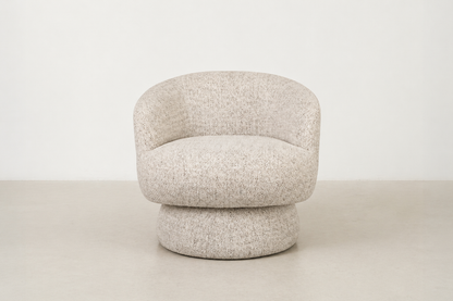  Living room needs Stamware – the chair that turns your space into a sanctuary. Wrapped in a soft taupe fabric with pillowy comfort and full swivel magic, it’s your new go-to for lazy mornings, cozy reads, and chic lounging. 