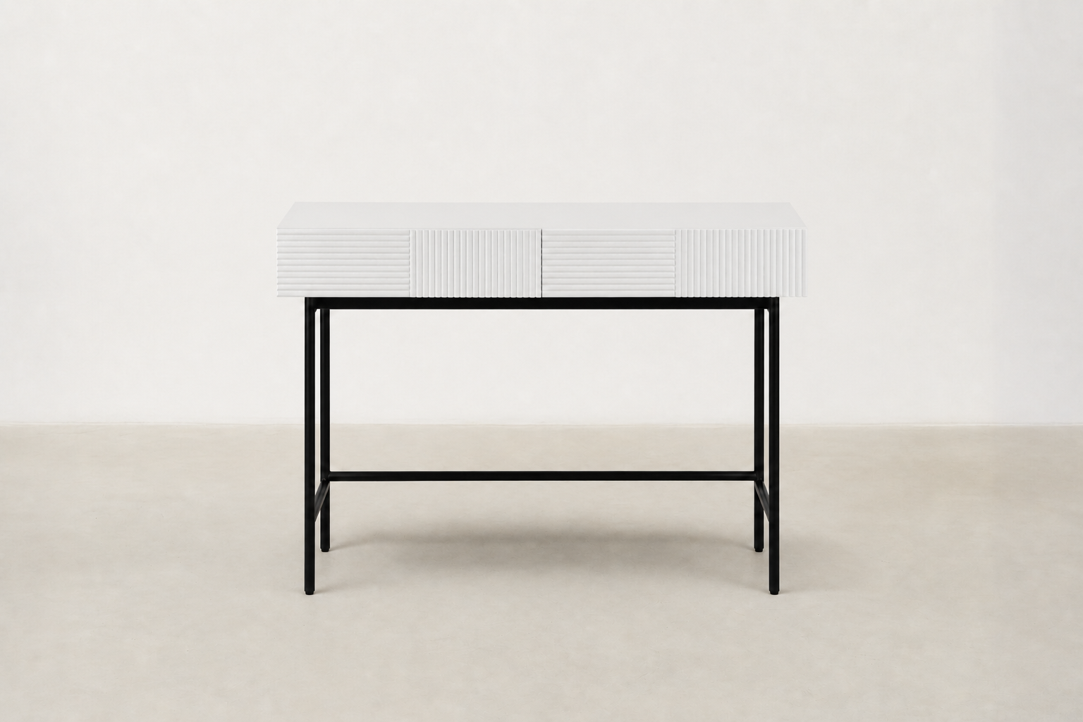 Strabury console table with fluted drawer fronts, two drawers, and black powder-coated metal legs