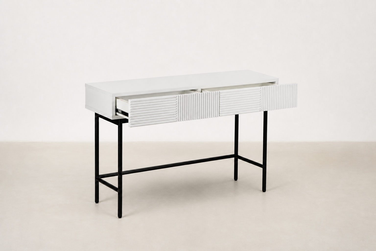 Strabury console table with fluted drawer fronts, two drawers, and black powder-coated metal legs