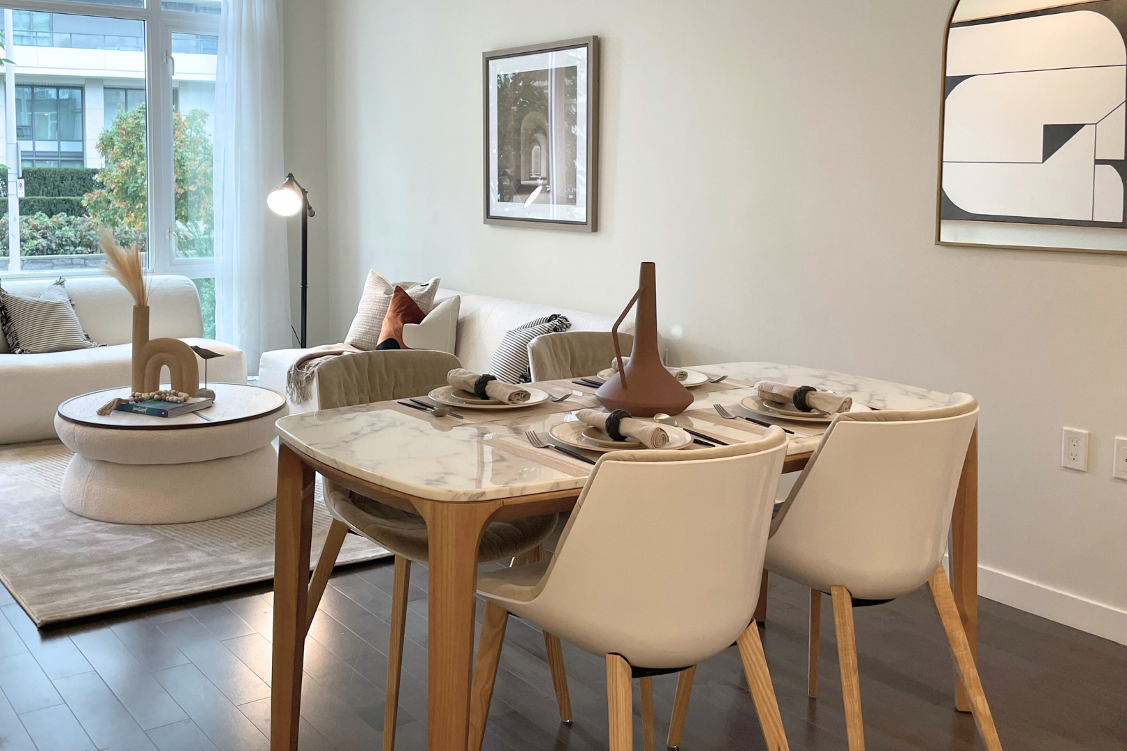 Maldola dining table with Carrara marble top and oak wood base in Japandi style